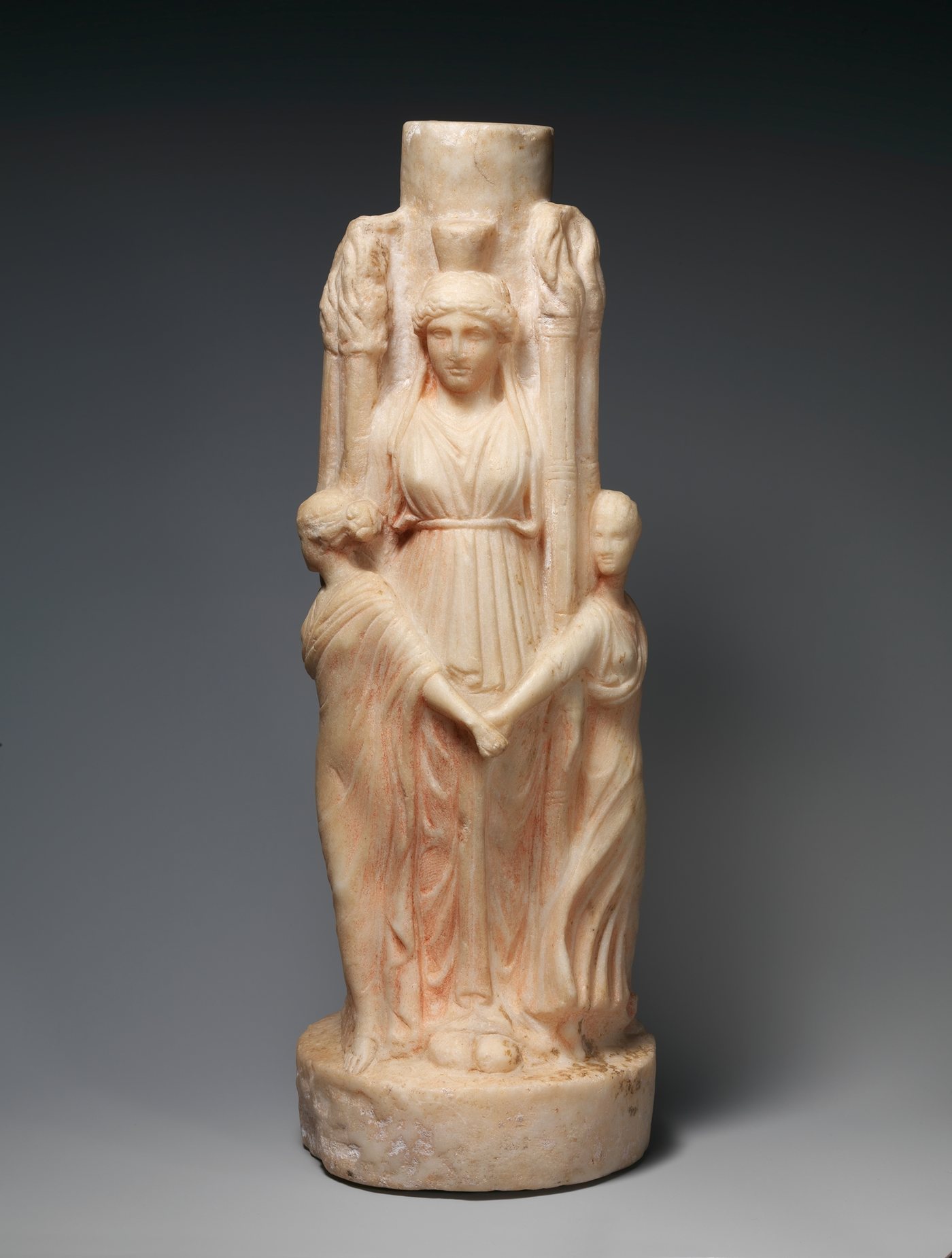 Marble hekataion (statuette of triple-bodied Hekate) and the three Graces, 1st–2nd century CE