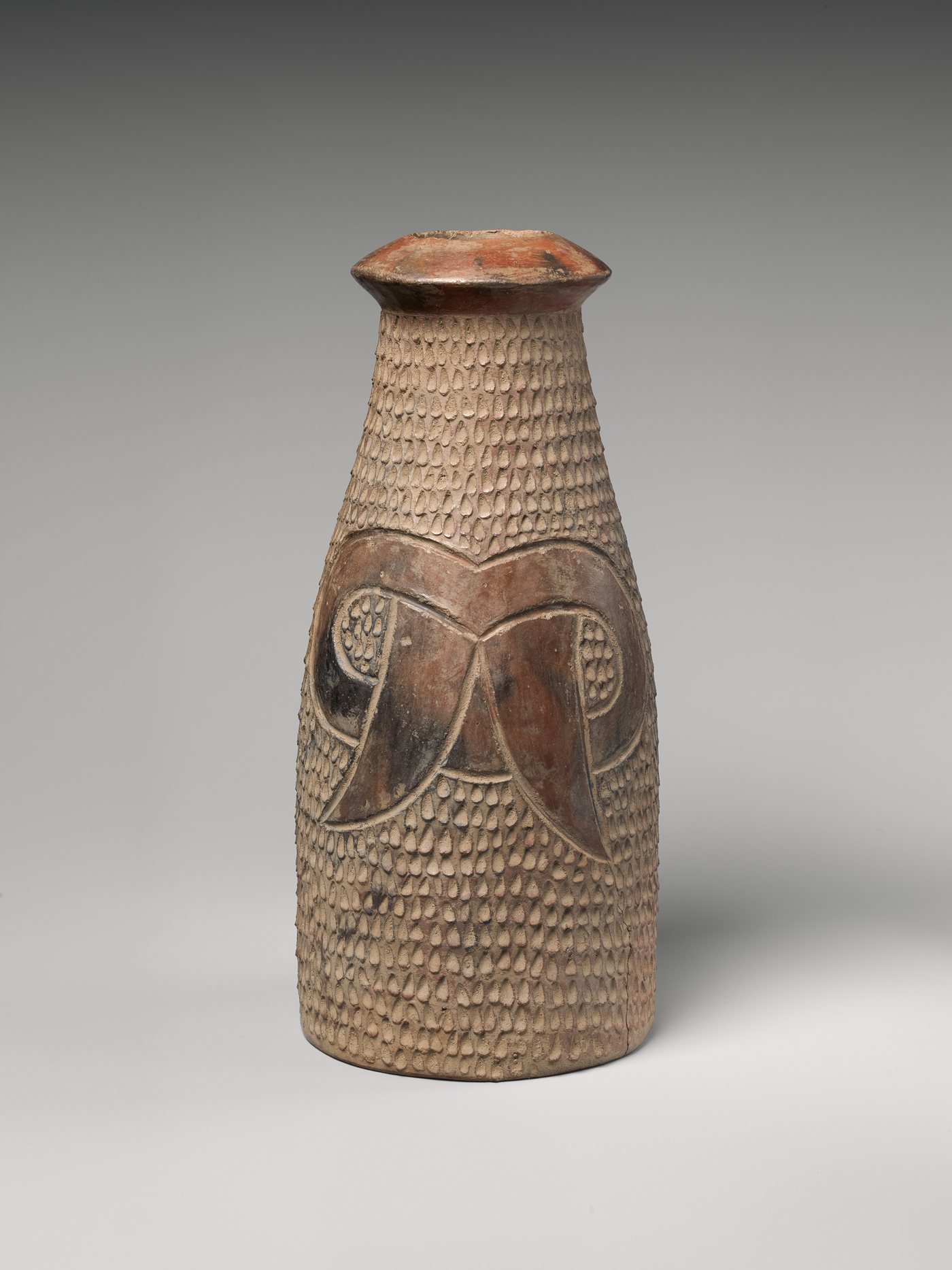 Bottle with fang motif, 800–550 BCE